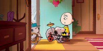 Movie still from “Snoopy Presents: For Auld Lang Syne” (2021), directed by Clay Kaytis – A group of people standing next to each other in a room; Medium shot, High angle