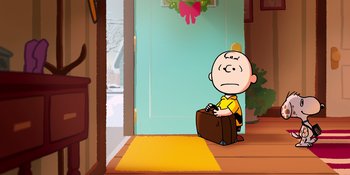Movie still from “Snoopy Presents: For Auld Lang Syne” (2021), directed by Clay Kaytis – A charlie brown sitting in front of a door; Extreme Wide shot, High angle