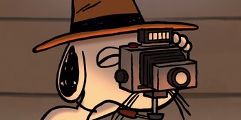 Movie still from “Snoopy Presents: For Auld Lang Syne” (2021), directed by Clay Kaytis – An image of an old camera with a hat on it; Extreme Close Up shot, Low angle