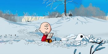 Movie still from “Snoopy Presents: For Auld Lang Syne” (2021), directed by Clay Kaytis – Charlie brown sitting in the snow reading a newspaper; Extreme Wide shot, High angle