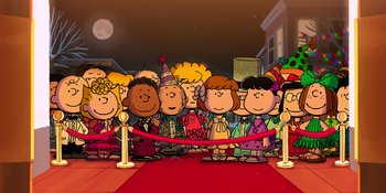 Movie still from “Snoopy Presents: For Auld Lang Syne” (2021), directed by Clay Kaytis – A group of people standing next to each other on a red carpet; Extreme Wide shot, High angle