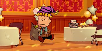 Movie still from “Snoopy Presents: For Auld Lang Syne” (2021), directed by Clay Kaytis – A charlie brown character sitting on the ground; Extreme Wide shot, High angle