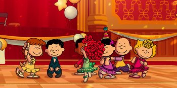 Movie still from “Snoopy Presents: For Auld Lang Syne” (2021), directed by Clay Kaytis – A group of children are dancing in a room; Extreme Wide shot, High angle