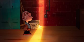 Movie still from “Snoopy Presents: For Auld Lang Syne” (2021), directed by Clay Kaytis – A charlie brown cartoon character standing in front of a brick wall; Extreme Wide shot, High angle