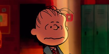 Movie still from “Snoopy Presents: For Auld Lang Syne” (2021), directed by Clay Kaytis – The head and shoulders of a charlie brown cartoon character; Close Up shot, Low angle