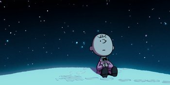 Movie still from “Snoopy Presents: For Auld Lang Syne” (2021), directed by Clay Kaytis – A drawing of a man sitting on the ground in front of the stars; Extreme Wide shot, High angle