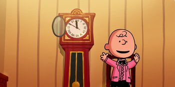 Movie still from “Snoopy Presents: For Auld Lang Syne” (2021), directed by Clay Kaytis – Charlie brown standing next to a grandfather clock; Extreme Wide shot, High angle
