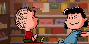 Movie still from “Snoopy Presents: Lucy's School” (2022), directed by Raymond S. Persi – A cartoon of a boy in a red striped shirt and mickey mouse; Medium shot, Over the shoulder angle