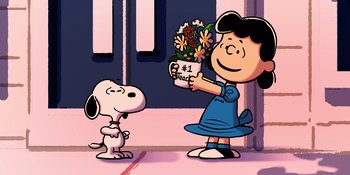 Movie still from “Snoopy Presents: Lucy's School” (2022), directed by Raymond S. Persi – A girl holding a vase of flowers next to a dog; Extreme Wide shot, High angle