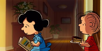 Movie still from “Snoopy Presents: Lucy's School” (2022), directed by Raymond S. Persi – A girl in a blue dress sitting on the floor reading a book; Wide shot, High angle