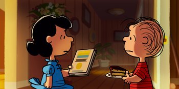 Movie still from “Snoopy Presents: Lucy's School” (2022), directed by Raymond S. Persi – A couple of people that are looking at a book; Medium shot, High angle