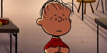 Movie still from “Snoopy Presents: Lucy's School” (2022), directed by Raymond S. Persi – A cartoon of a boy in a red shirt looking sad; Close Up shot, High angle