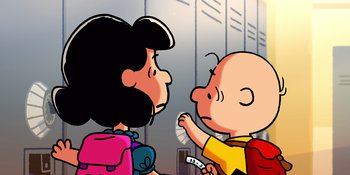 Movie still from “Snoopy Presents: Lucy's School” (2022), directed by Raymond S. Persi – A couple of people standing next to each other in a room; Medium shot, High angle
