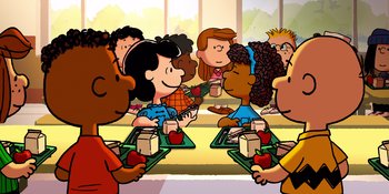 Movie still from “Snoopy Presents: Lucy's School” (2022), directed by Raymond S. Persi – A group of children sitting at a table eating; Extreme Wide shot, High angle
