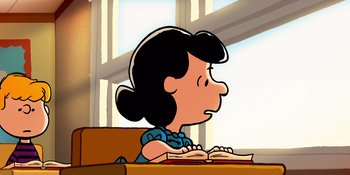 Movie still from “Snoopy Presents: Lucy's School” (2022), directed by Raymond S. Persi – A drawing of a woman sitting at a desk; Medium shot, High angle