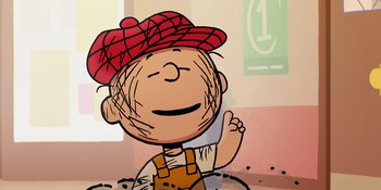 Movie still from “Snoopy Presents: One-of-a-Kind Marcie” (2023), directed by Raymond S. Persi – A drawing of charlie brown wearing a red hat and overalls; Close Up shot, High angle