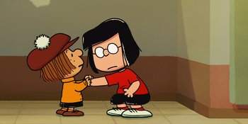 Movie still from “Snoopy Presents: One-of-a-Kind Marcie” (2023), directed by Raymond S. Persi – A girl and a boy holding hands in a room; Medium shot, High angle