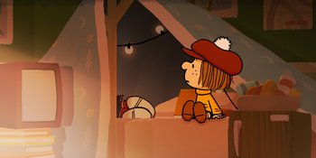 Movie still from “Snoopy Presents: One-of-a-Kind Marcie” (2023), directed by Raymond S. Persi – A drawing of a girl sitting on the ground; Wide shot, High angle