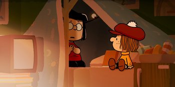 Movie still from “Snoopy Presents: One-of-a-Kind Marcie” (2023), directed by Raymond S. Persi – A couple of people that are sitting in the grass; Medium shot, High angle