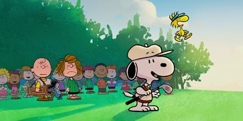 Movie still from “Snoopy Presents: One-of-a-Kind Marcie” (2023), directed by Raymond S. Persi – A group of people in a field playing golf; Extreme Wide shot, Low angle