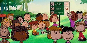 Movie still from “Snoopy Presents: One-of-a-Kind Marcie” (2023), directed by Raymond S. Persi – A group of people sitting in the grass holding signs; Extreme Wide shot, High angle