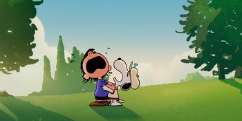 Movie still from “Snoopy Presents: One-of-a-Kind Marcie” (2023), directed by Raymond S. Persi – A boy and a dog are standing in a field; Extreme Wide shot, Low angle