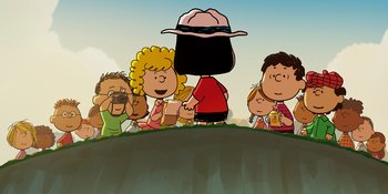 Movie still from “Snoopy Presents: One-of-a-Kind Marcie” (2023), directed by Raymond S. Persi – A group of people standing around a hill; Extreme Wide shot, High angle