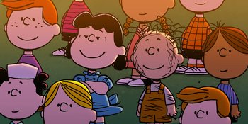 Movie still from “Snoopy Presents: One-of-a-Kind Marcie” (2023), directed by Raymond S. Persi – A group of people standing next to each other in a field; Close Up shot, High angle