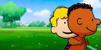 Movie still from “Snoopy Presents: To Mom (and Dad), with Love” (2022), directed by Clay Kaytis – A boy and a girl in a grassy field; Close Up shot, Over the shoulder angle