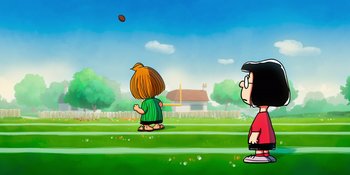 Movie still from “Snoopy Presents: To Mom (and Dad), with Love” (2022), directed by Clay Kaytis – Two cartoon characters are playing football in a field; Extreme Wide shot, Low angle