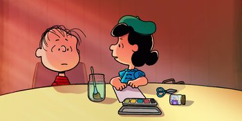 Movie still from “Snoopy Presents: To Mom (and Dad), with Love” (2022), directed by Clay Kaytis – A girl sitting at a table with a paint brush and a jar; Medium shot, Over the shoulder angle