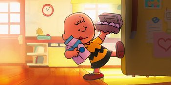 Movie still from “Snoopy Presents: To Mom (and Dad), with Love” (2022), directed by Clay Kaytis – A cartoon of a boy holding something in his hand; Medium shot, Overhead angle