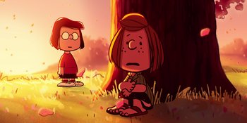 Movie still from “Snoopy Presents: To Mom (and Dad), with Love” (2022), directed by Clay Kaytis – A girl and a boy sitting in the grass; Extreme Wide shot, High angle