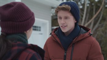 Movie still from “Snow Day” (2022), directed by Michael Lembeck – Two young men talking to each other outside in the snow; Close Up shot, Over the shoulder angle