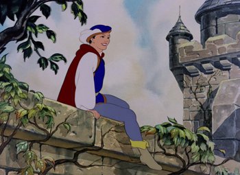 Movie still from “Snow White and the Seven Dwarfs” (1937), directed by Larry Morey – A painting of a man sitting on a stone wall near a castle; Wide shot, Low angle