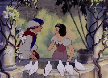 Movie still from “Snow White and the Seven Dwarfs” (1937), directed by Larry Morey – A painting of snow white and the seven dwarfs; Medium shot, Over the shoulder angle