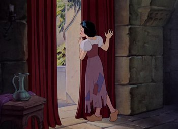 Movie still from “Snow White and the Seven Dwarfs” (1937), directed by Larry Morey – Snow white is standing in front of a window; Wide shot, Low angle