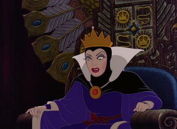 Movie still from “Snow White and the Seven Dwarfs” (1937), directed by Larry Morey – The evil queen from snow white sitting on a couch; Medium shot, Over the shoulder angle