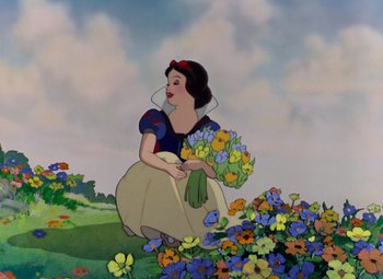 Movie still from “Snow White and the Seven Dwarfs” (1937), directed by Larry Morey – A painting of snow white holding a bunch of flowers; Wide shot, Low angle