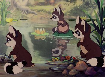 Movie still from “Snow White and the Seven Dwarfs” (1937), directed by Larry Morey – A group of animals sitting on top of a pond; Wide shot, High angle