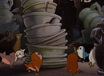 Movie still from “Snow White and the Seven Dwarfs” (1937), directed by Larry Morey – A group of birds standing next to a pile of plates; Medium shot, High angle