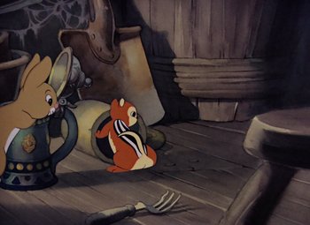 Movie still from “Snow White and the Seven Dwarfs” (1937), directed by Larry Morey – An animated scene of a mouse and a bear; Wide shot, High angle