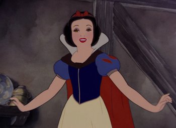 Movie still from “Snow White and the Seven Dwarfs” (1937), directed by Larry Morey – A snow white character is standing in front of a wall; Medium shot, Over the shoulder angle