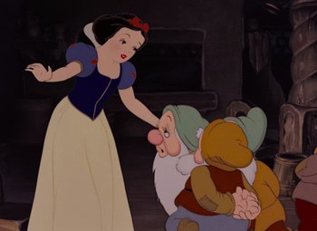 Movie still from “Snow White and the Seven Dwarfs” (1937), directed by Larry Morey – Snow white and the seven dwarfs in a scene from snow white and the seven dwarfs; Medium shot, Over the shoulder angle
