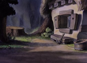 Movie still from “Snow White and the Seven Dwarfs” (1937), directed by Larry Morey – A painting of a house in the middle of a forest; Wide shot, High angle