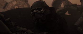 Movie still from “Solo: A Star Wars Story” (2018), directed by Ron Howard – A helmet with a gas mask on it; Close Up shot, Low angle