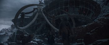 Movie still from “Solo: A Star Wars Story” (2018), directed by Ron Howard – A group of people standing next to each other in the snow; Extreme Wide shot, Low angle