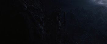 Movie still from “Solo: A Star Wars Story” (2018), directed by Ron Howard – A dark picture of a dark night with a lot of light coming through the window; Wide shot, Low angle