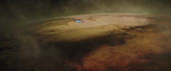 Movie still from “Solo: A Star Wars Story” (2018), directed by Ron Howard – An aerial view of the earth from a plane; Extreme Wide shot, Overhead angle