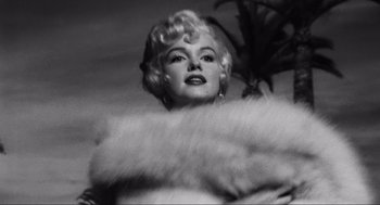 Movie still from “Some Like It Hot” (1959), directed by Billy Wilder – A black - and - white photo of a woman in a fur coat; Close Up shot, Low angle